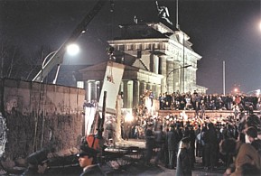 Tearing Down the Berlin Wall at night
