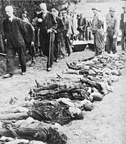 Allies force Germans to look at corpses of concentration camp victims
