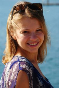 Maria Fedorova headshot with ocean in the background