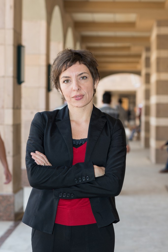 Sherene Seikaly in outdoor corridor