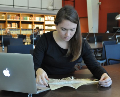 Photo of Graduate Student Sarah Hanson conducting archival research in Lille.