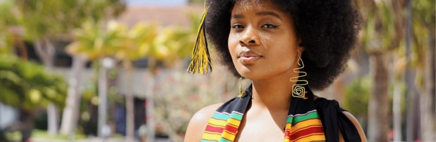Photo of young woman in graduation stole