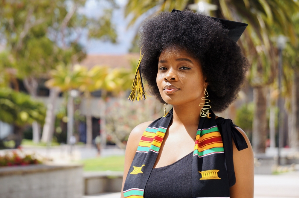 Photo of young woman in graduation stole