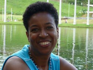 Evelyne Laurent-Perrault in front of body of water in park