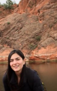 Maria del Pilar Ramirez Restrepo with water and mountain in the background