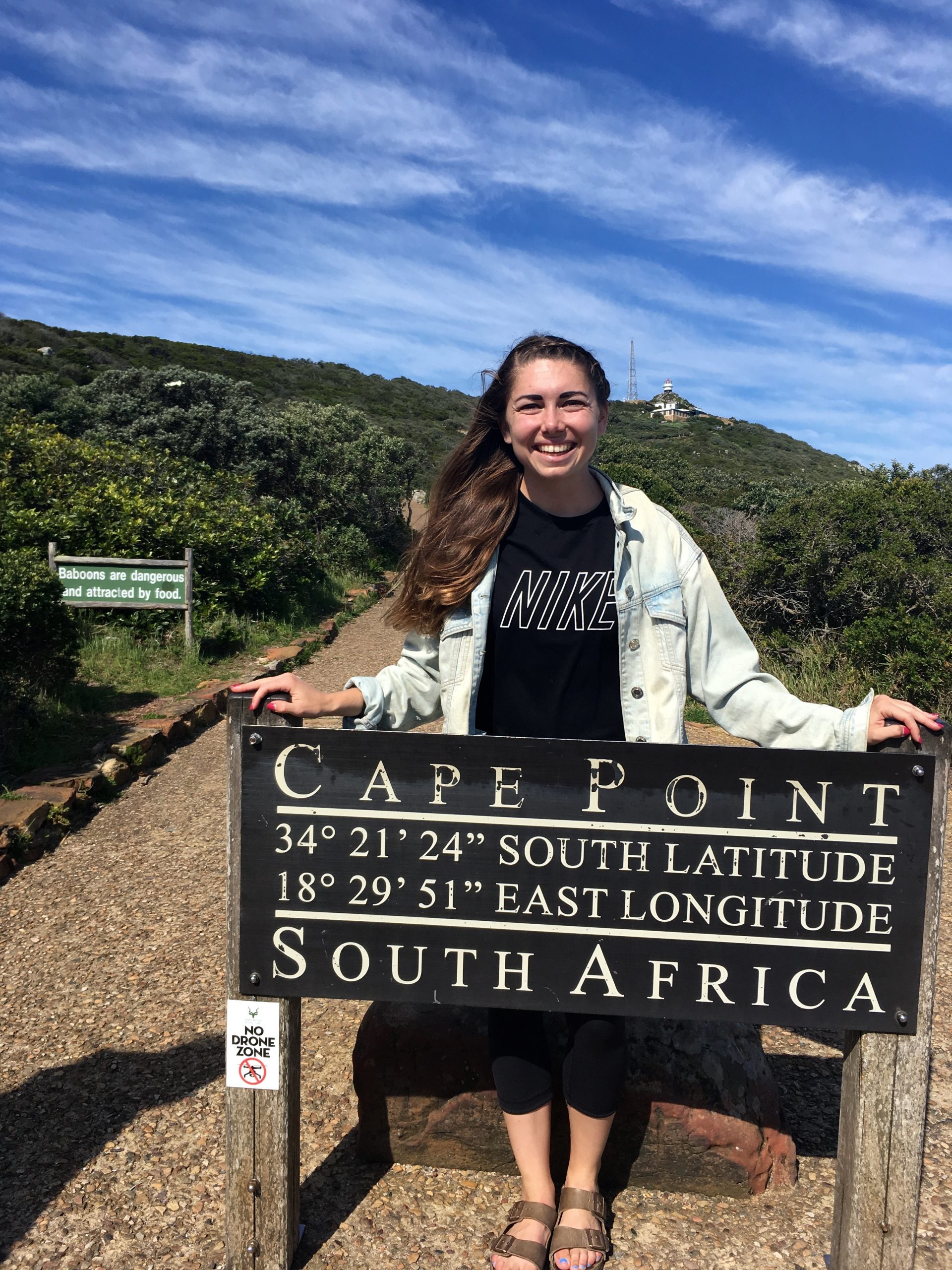 Mattie Webb in front of Cape Point South Africa sign
