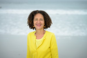 Alison Rose Jefferson on beach in front of ocean