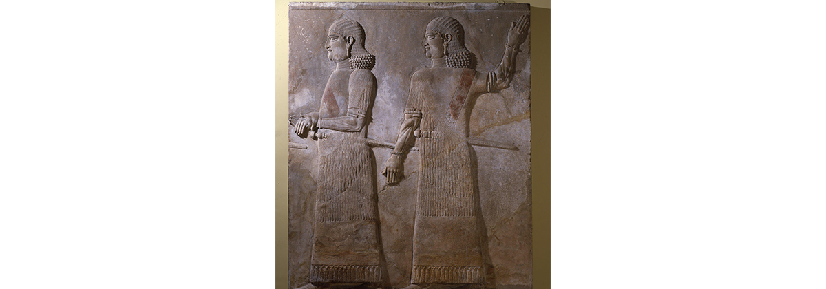 Two beardless Assyrian officials stone wall mural