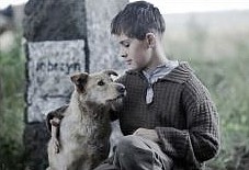 film still of a boy and a dog from film Run Boy Run