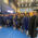 Graduates and faculty standing in line in the Thunderdome